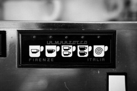 Major Coffee Chains Test AI Baristas as Labor Costs Rise Modern automated coffee brewing equipment in commercial setting
