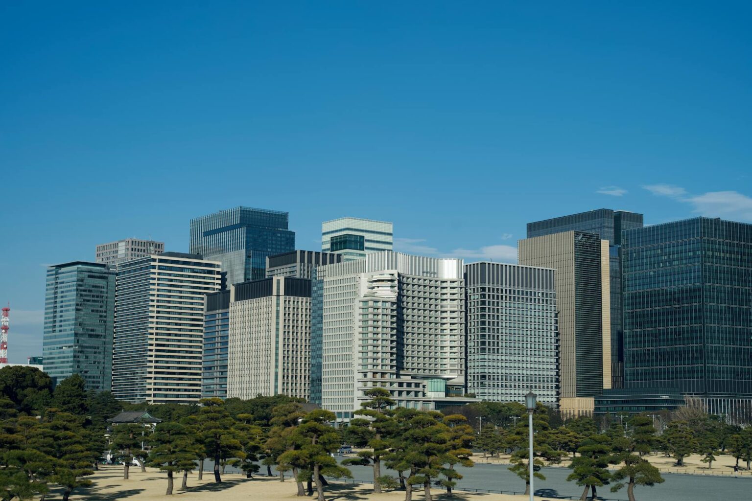 How Rising Interest Rates Are Making REITs Attractive Again Modern office buildings and skyscrapers representing commercial real estate investments