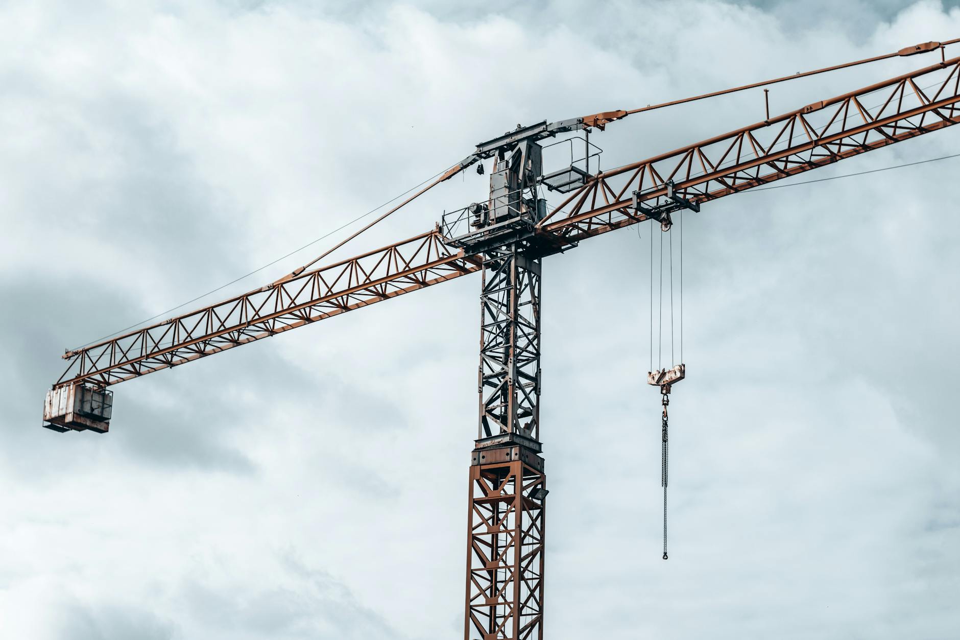 Construction crane working on infrastructure project symbolizing pension fund investment opportunities