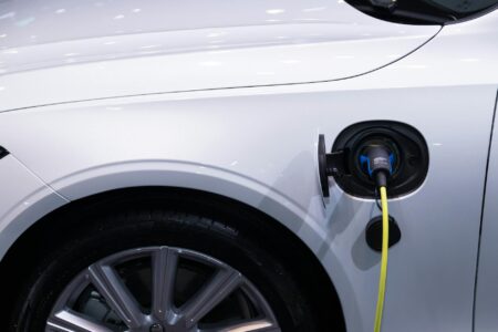 Electric vehicle charging at a public charging station