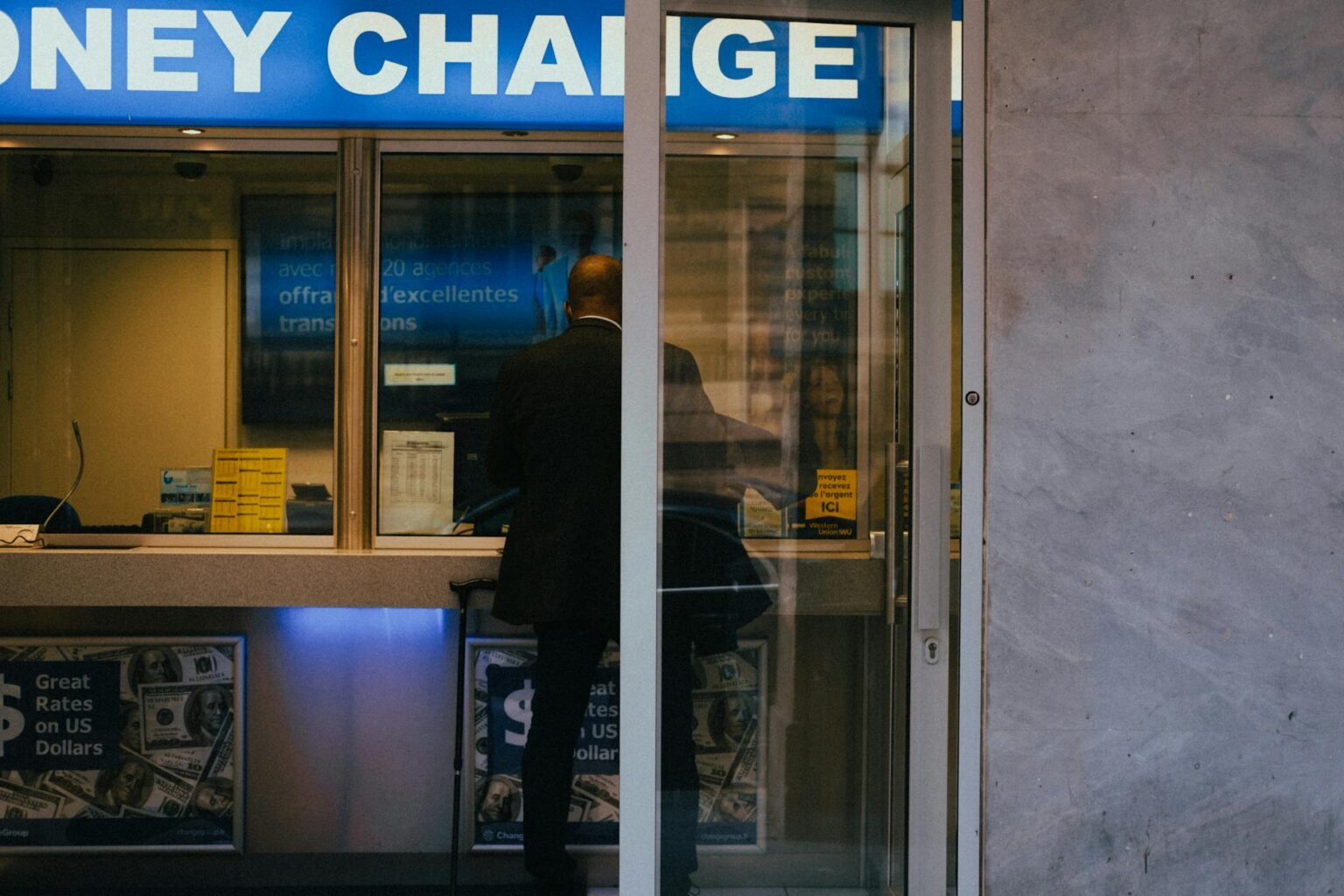 Small Business Lending Tightens as Regional Banks Face Deposit Flight Interior of a modern bank branch with teller windows and customer seating area