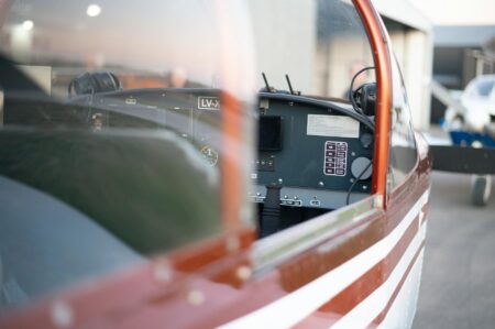 Major Airlines Restructure Route Networks Following Pilot Shortage Crisis Commercial aircraft cockpit showing pilot controls and instruments