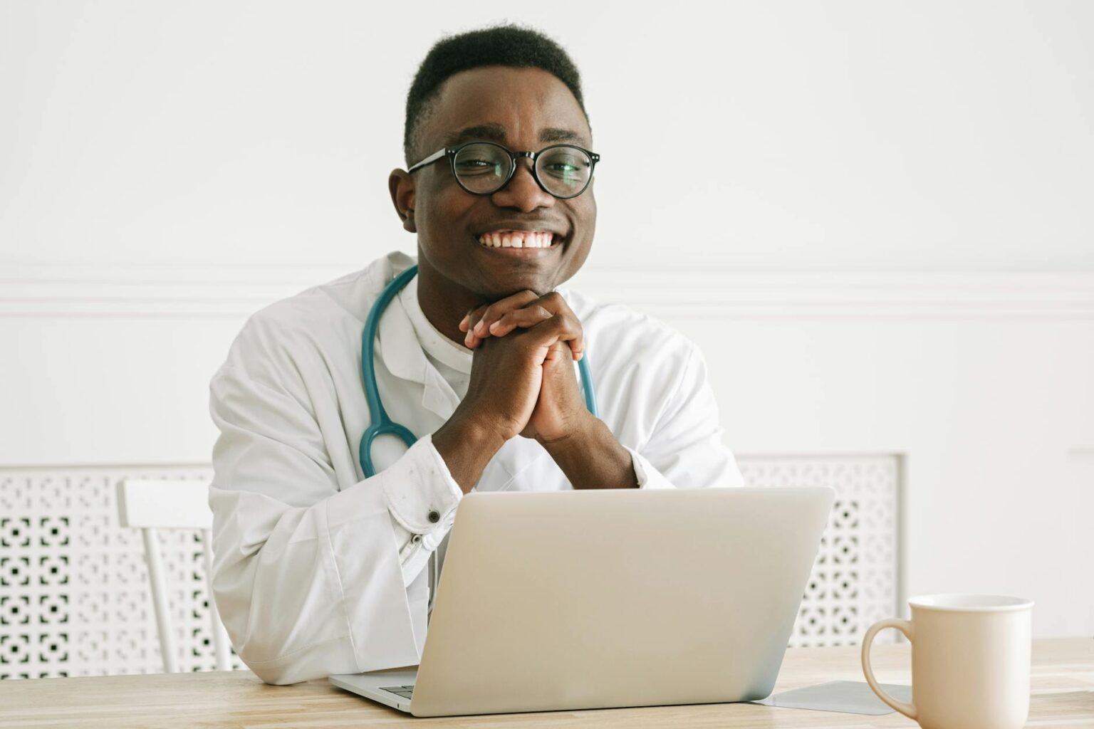 Healthcare professional using laptop computer for telehealth consultation