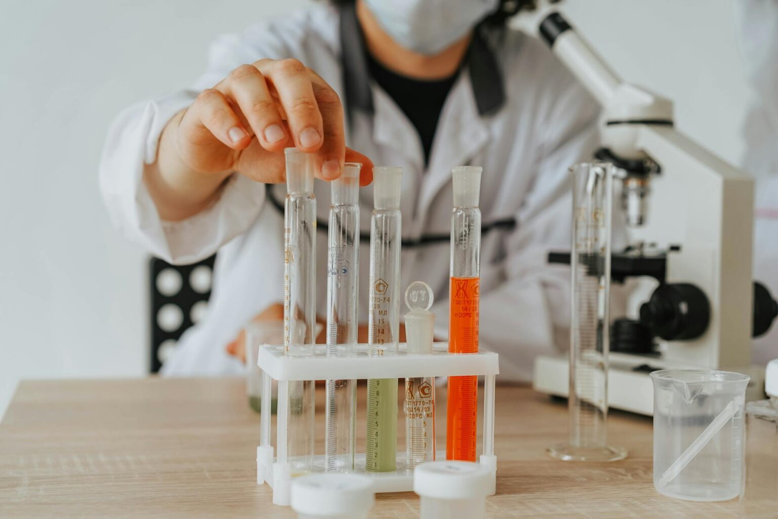 Scientists conducting pharmaceutical research in modern laboratory setting