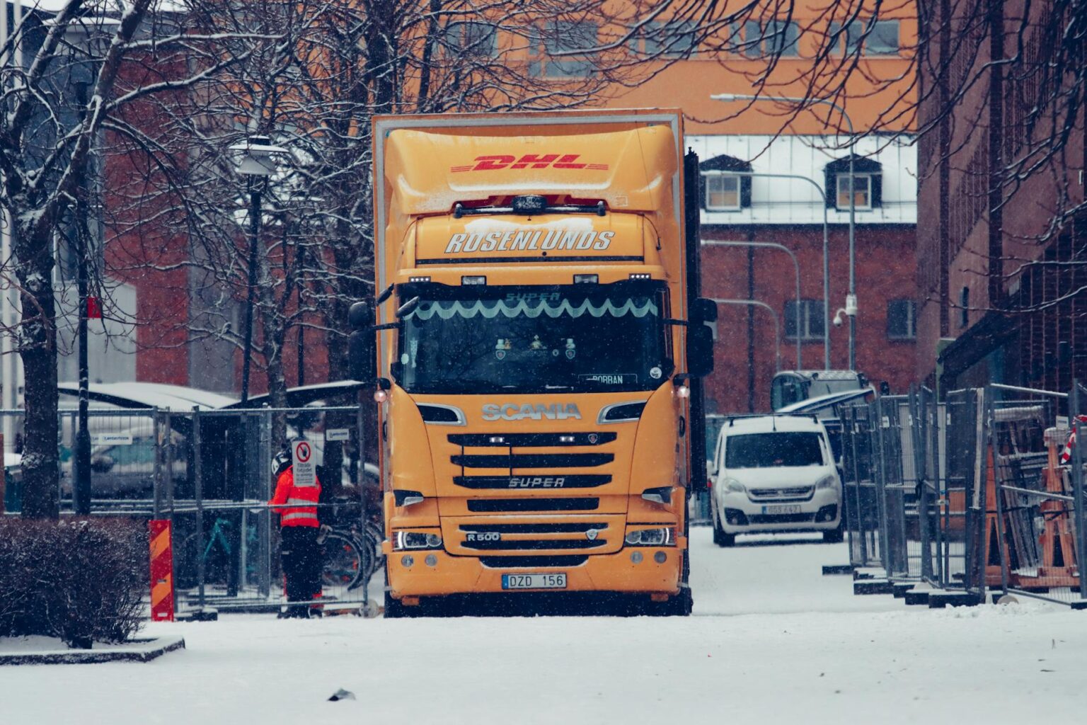 Silicon Valley Layoffs Create Tech Talent Migration to Austin Moving truck on residential street representing tech worker relocation
