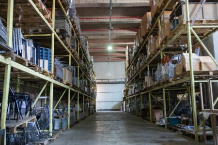 Large warehouse retail interior with high shelves and bulk merchandise displays