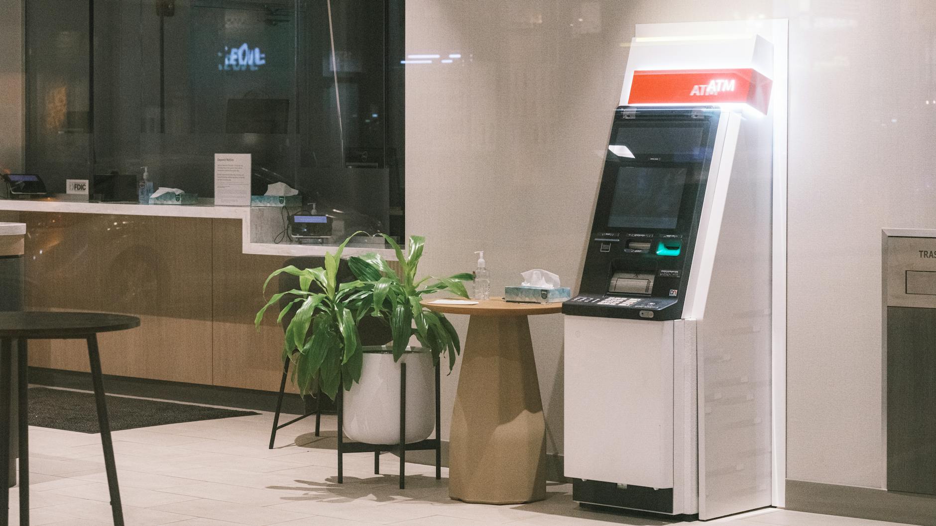 Modern bank interior with teller windows and professional lighting