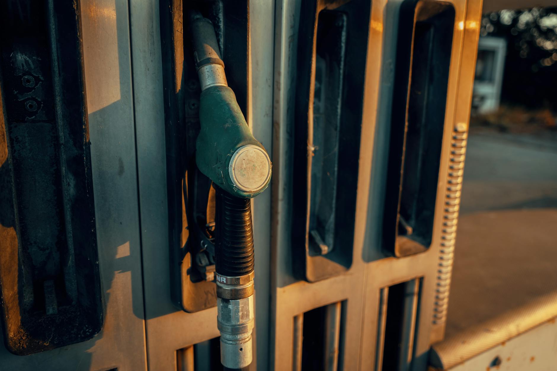 Industrial oil pumping equipment against blue sky representing energy sector momentum