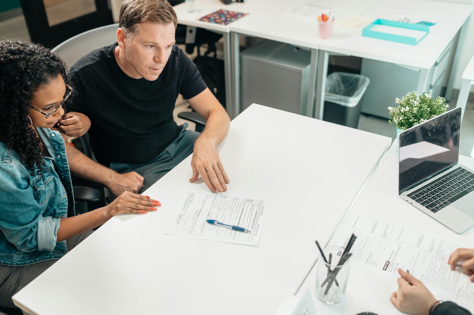 Financial advisor discussing investment portfolio with client