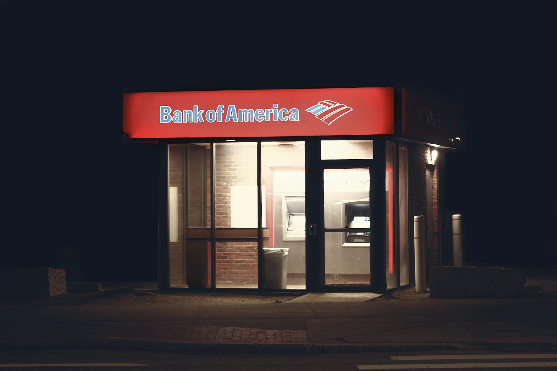 Modern glass bank building exterior representing financial institutions