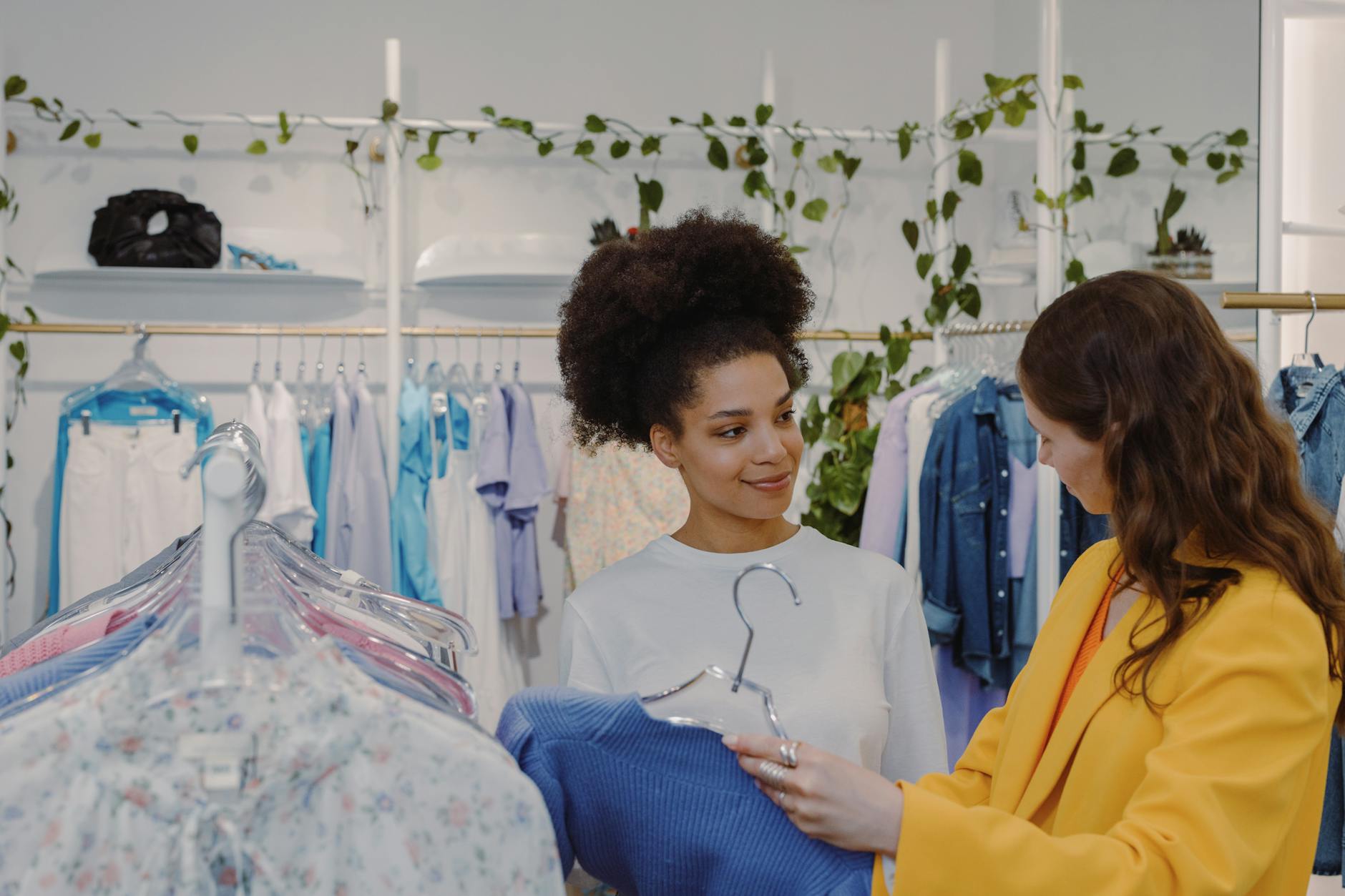 Customers browsing products in a bright, modern retail store environment