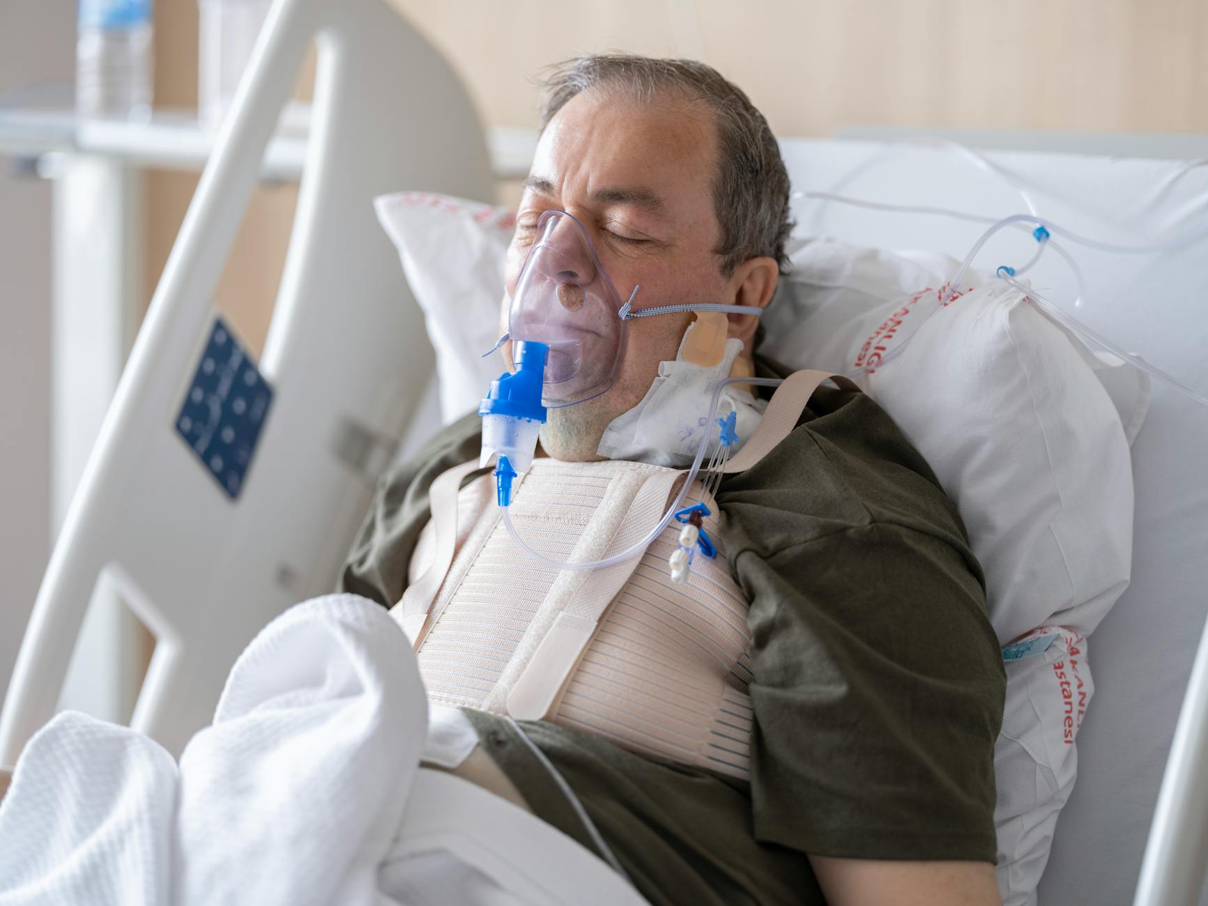 Senior patient consulting with healthcare provider in modern medical facility