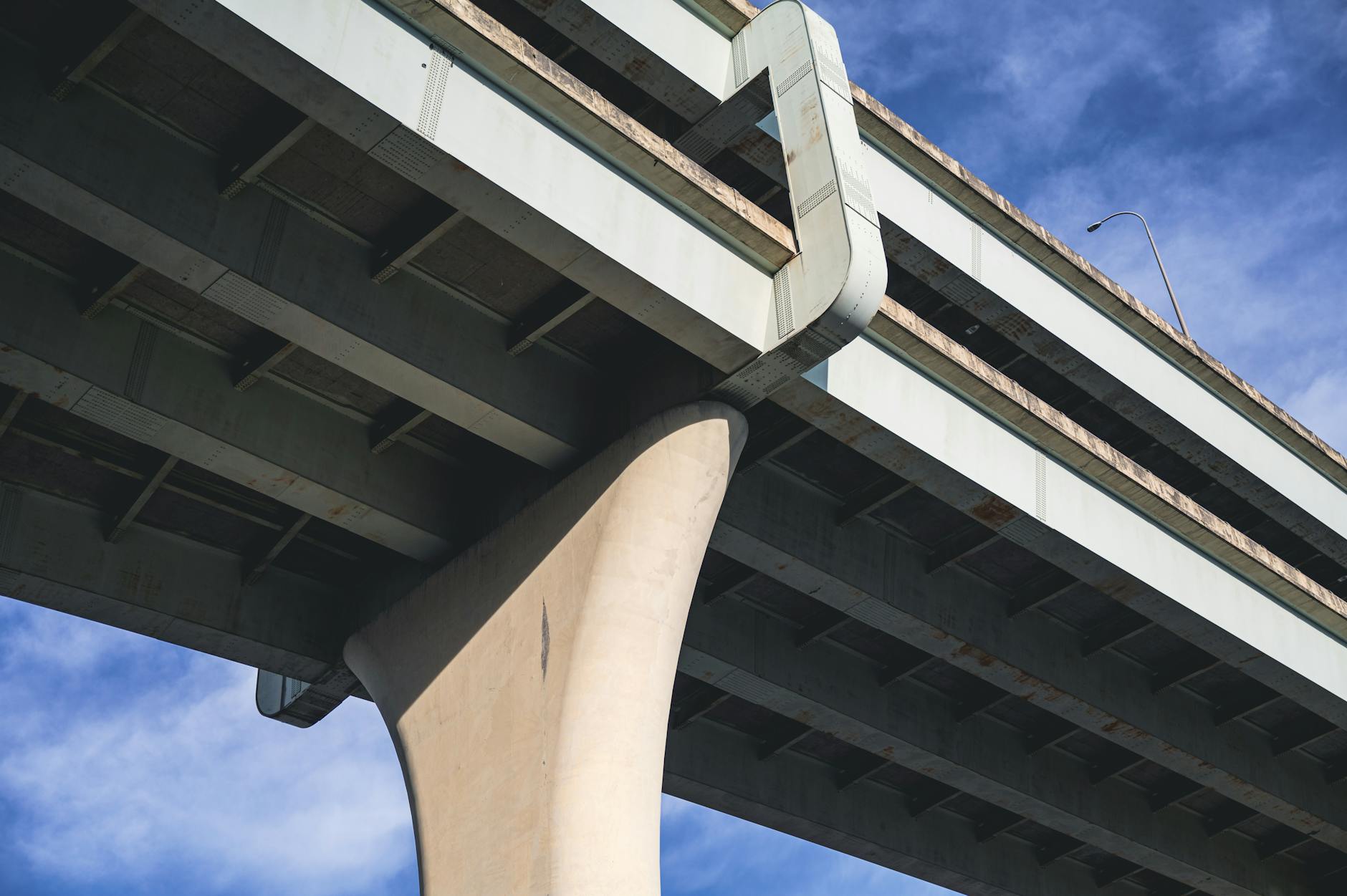 Modern highway bridge demonstrating transportation infrastructure assets that attract pension fund investment