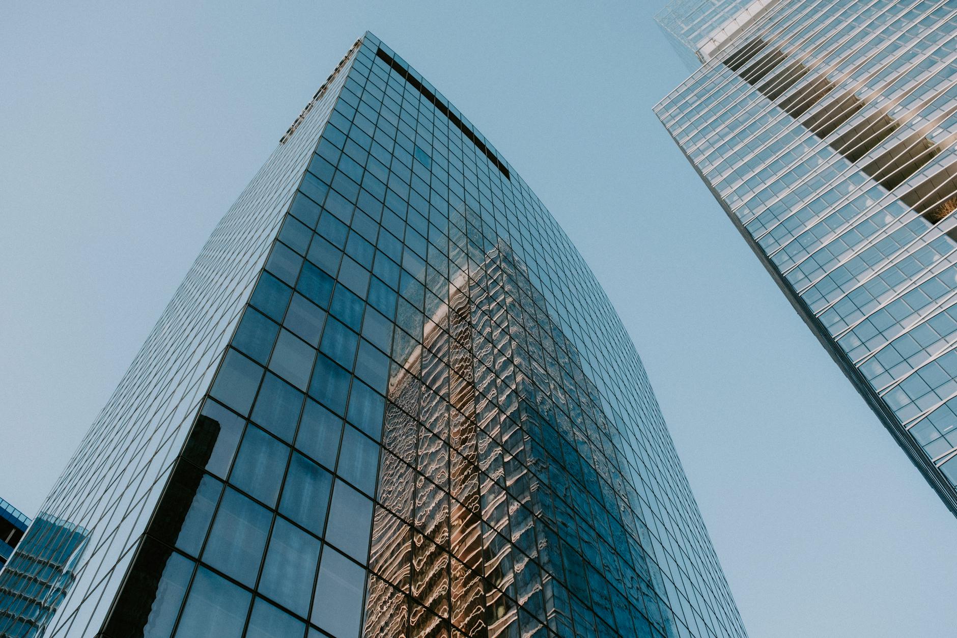 Modern glass office building representing financial institutions and corporate headquarters