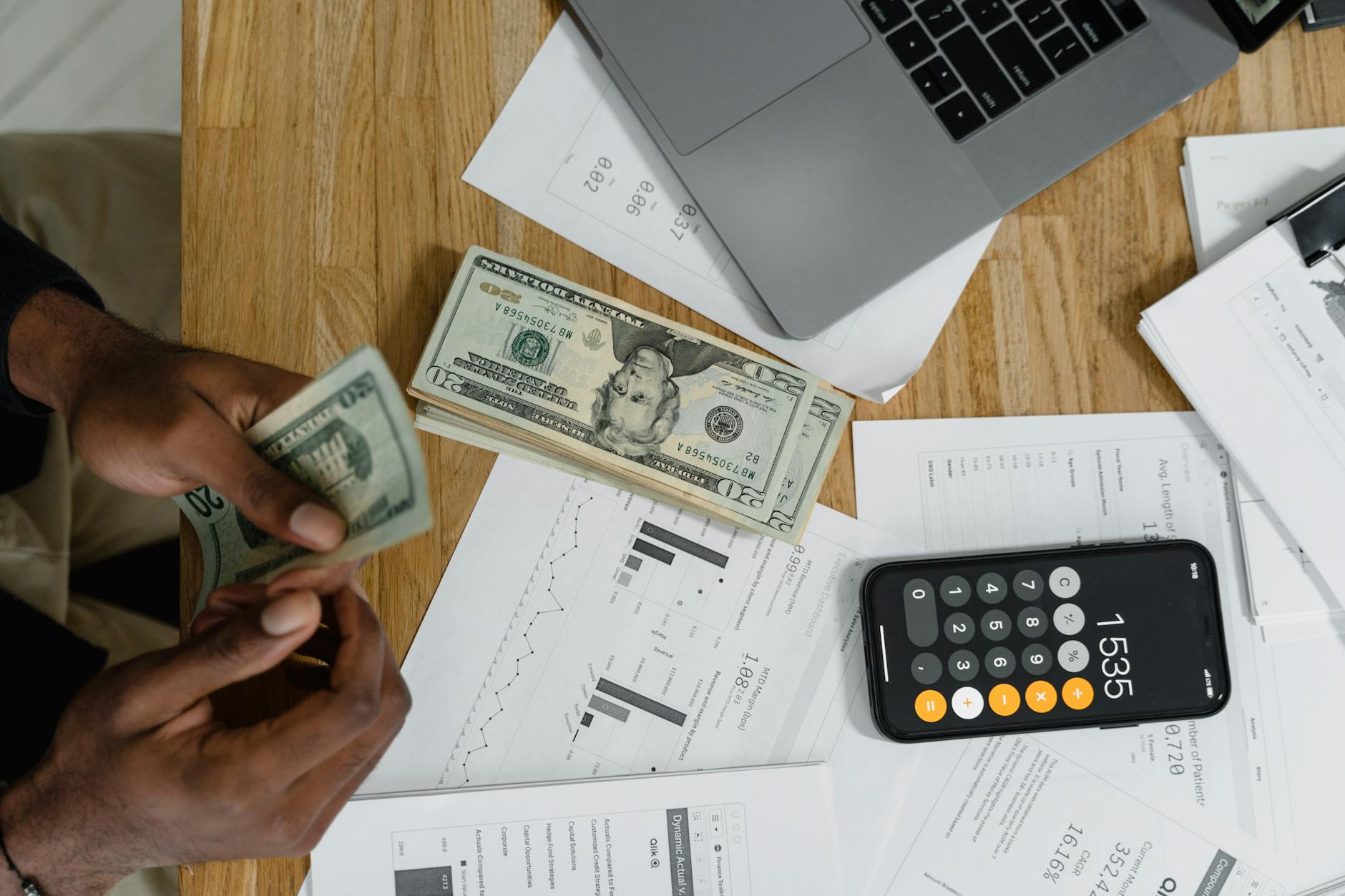 Financial planning documents and calculator for real estate investment analysis