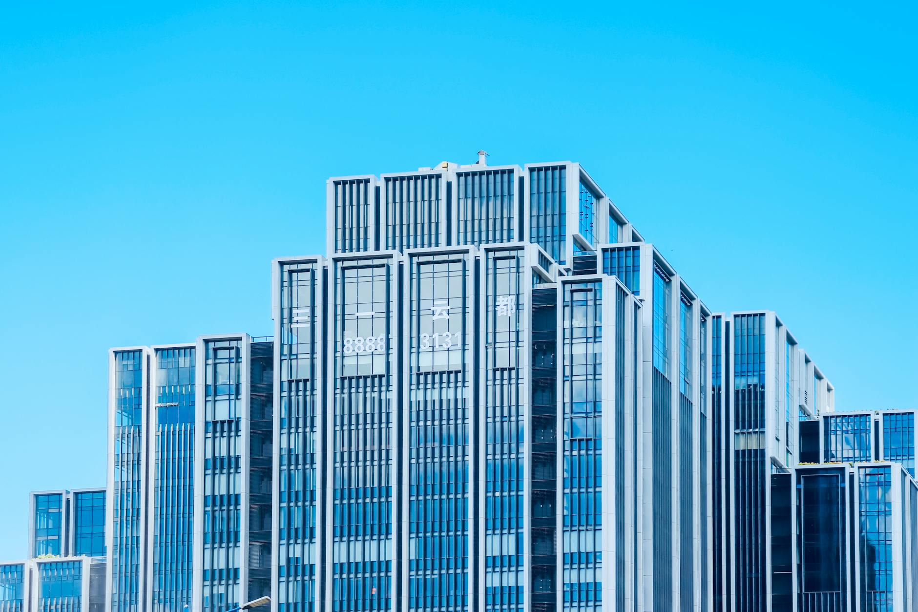Modern office building representing insurance-light commercial real estate investments