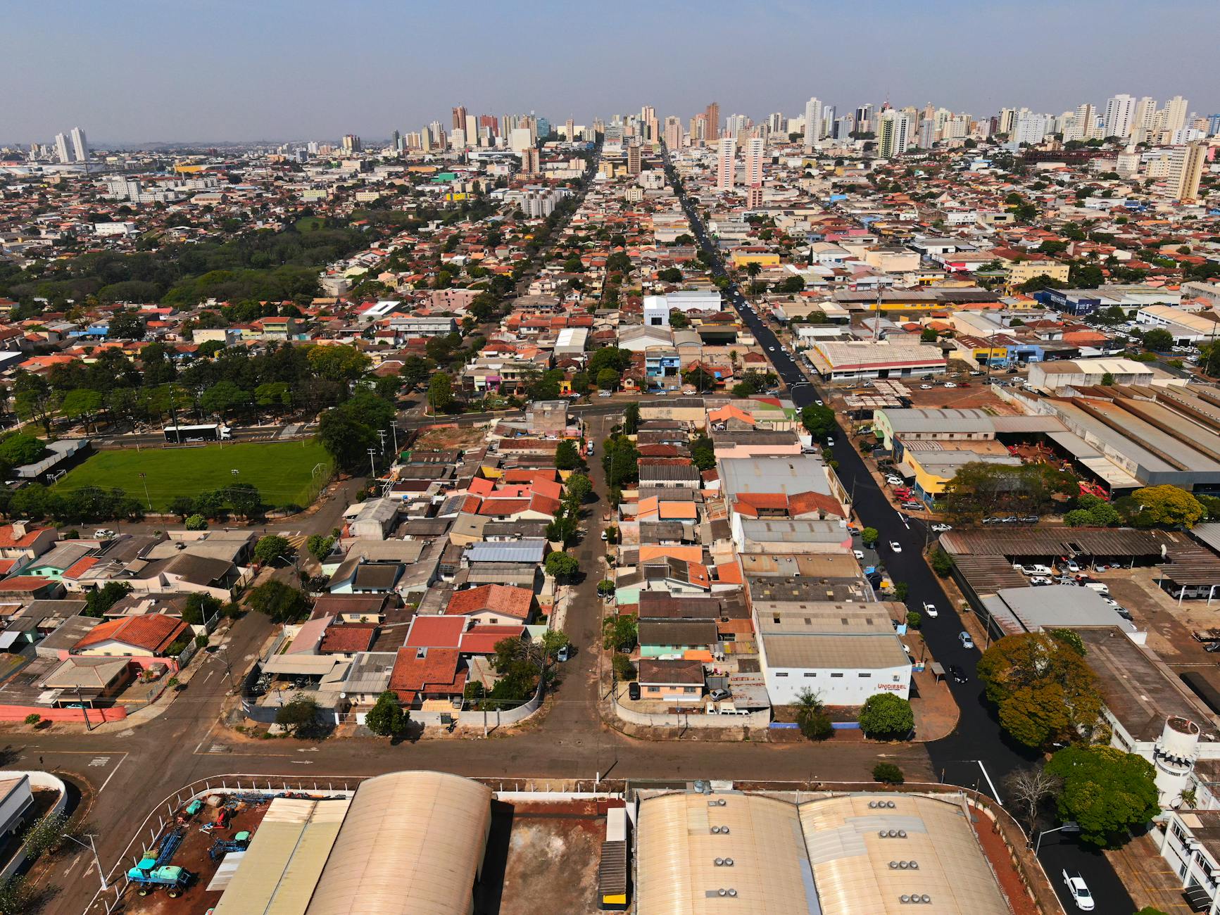 City planning meeting with officials reviewing infrastructure development maps