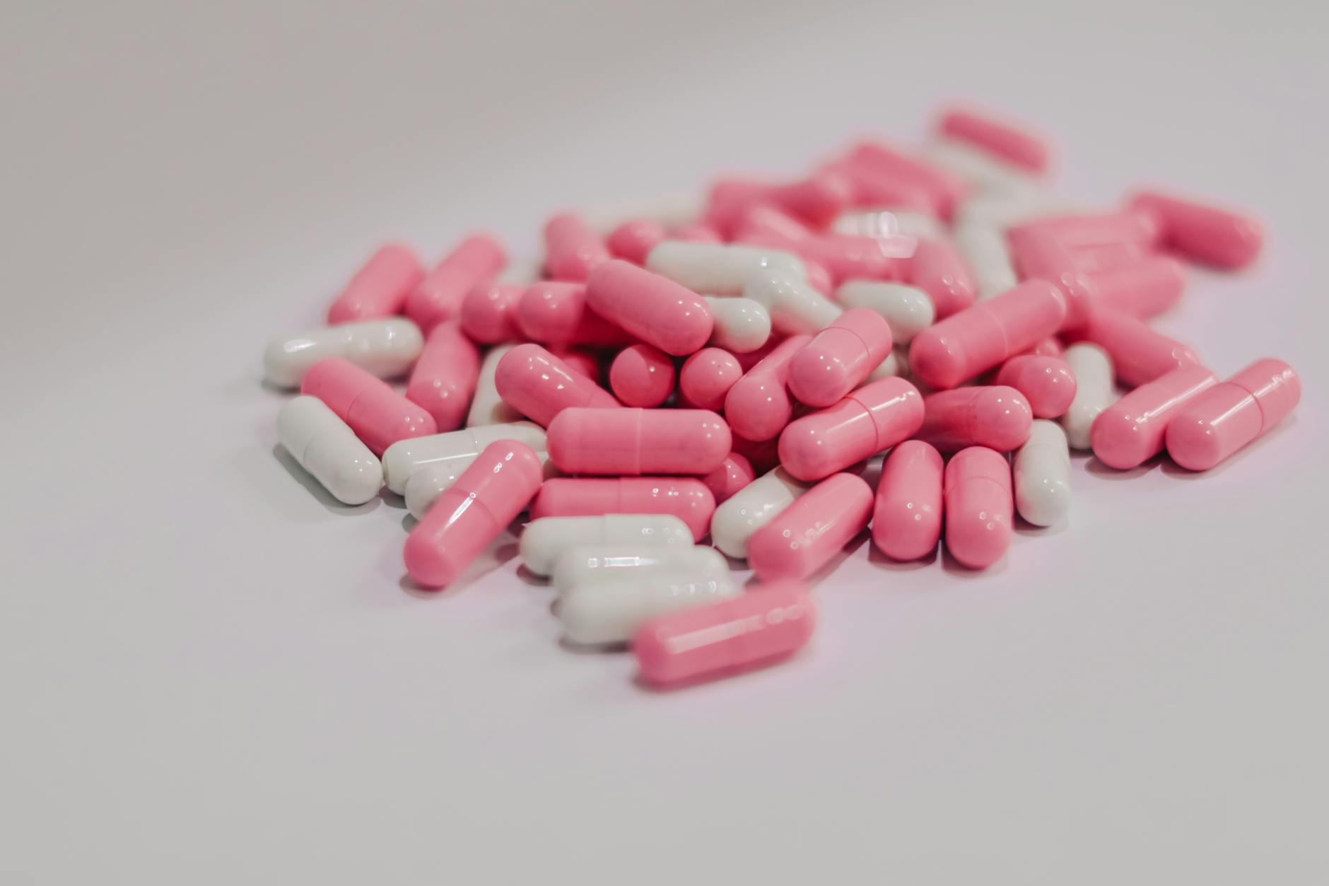 Pharmaceutical pills and medications representing drug development and FDA approvals