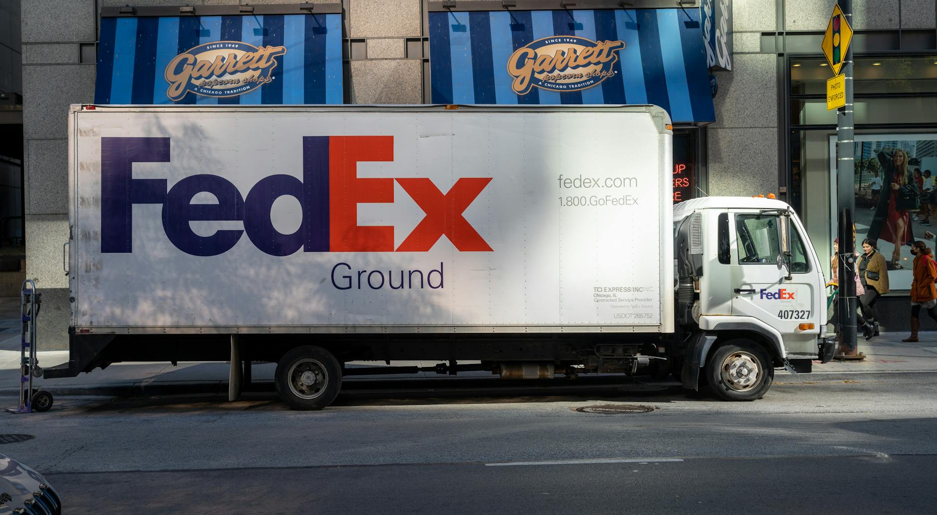 White delivery truck on residential street for pharmaceutical delivery services