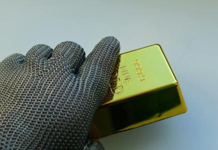 Gold ETF Inflows Hit Multi-Year Highs Amid Dollar Weakness Stacked gold bars representing rising demand for gold as a store of value