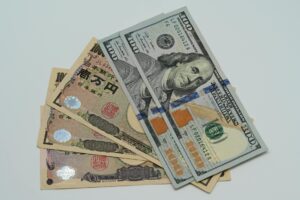 Currency exchange board showing multiple global currencies fluctuating in value