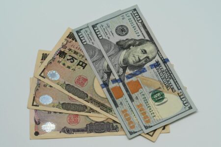 Currency exchange board showing multiple global currencies fluctuating in value