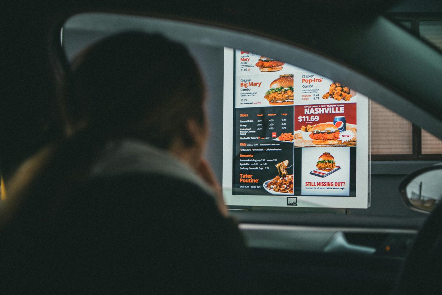 Modern fast food restaurant exterior with parking area and pickup zones