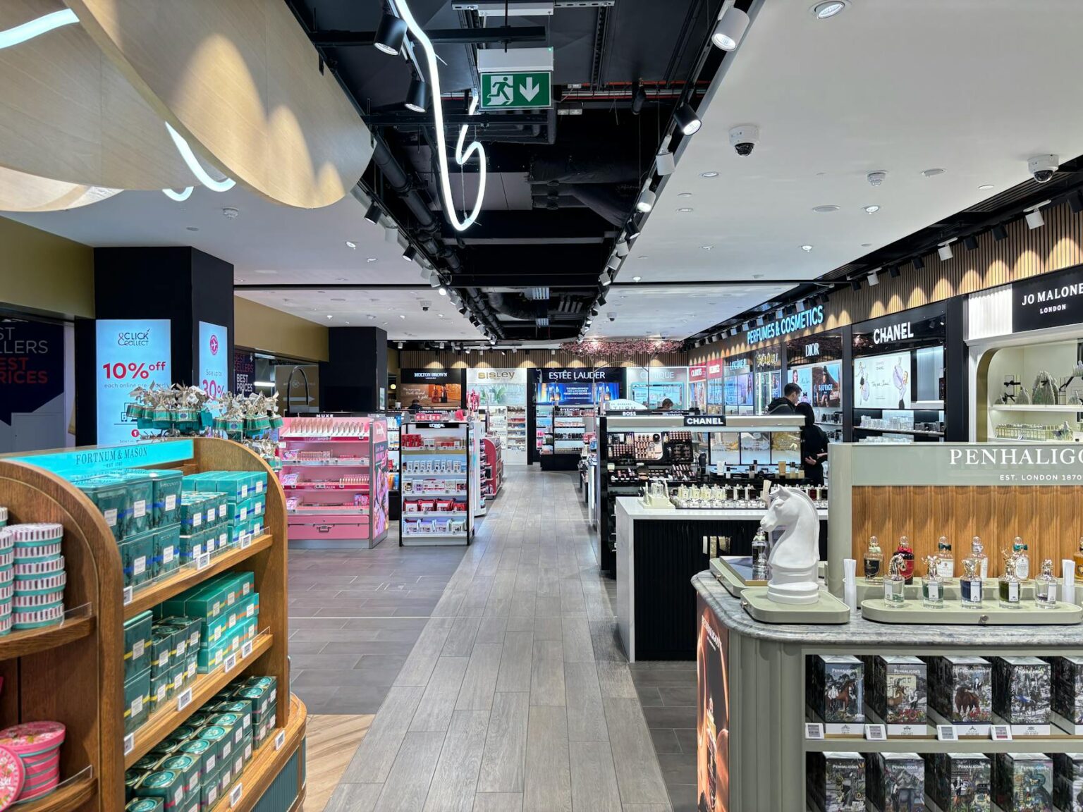 Interior view of modern department store with open floor layout and service counters