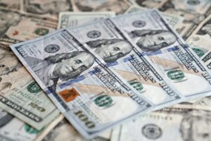 Stack of government bond certificates representing Treasury securities investment