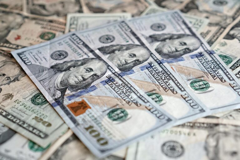 Stack of government bond certificates representing Treasury securities investment