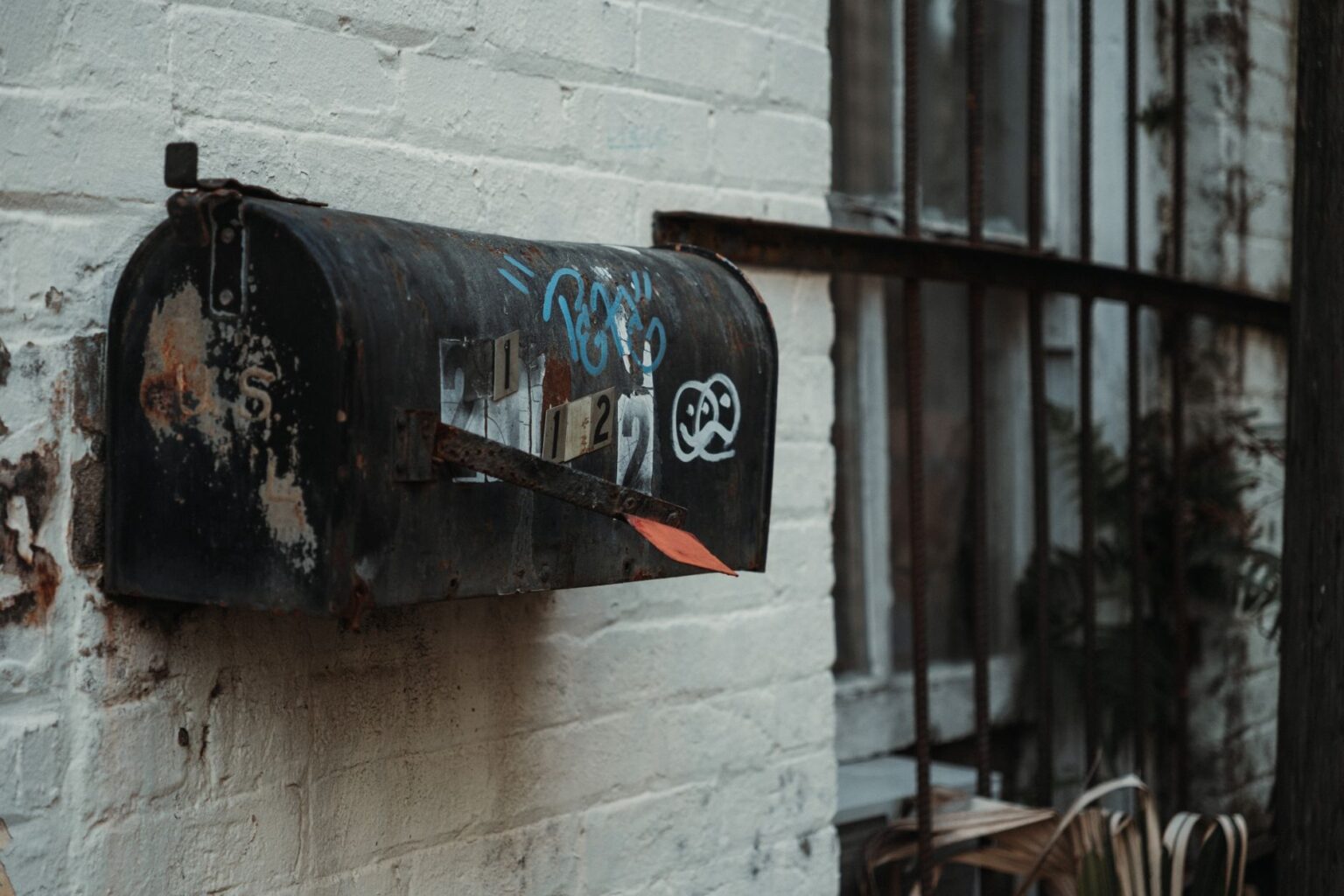 Empty residential mailbox representing declining physical mail volume