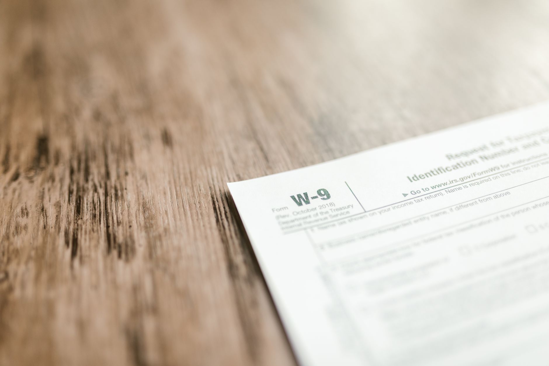 Pay stub and financial paperwork representing wage and benefit calculations for working families