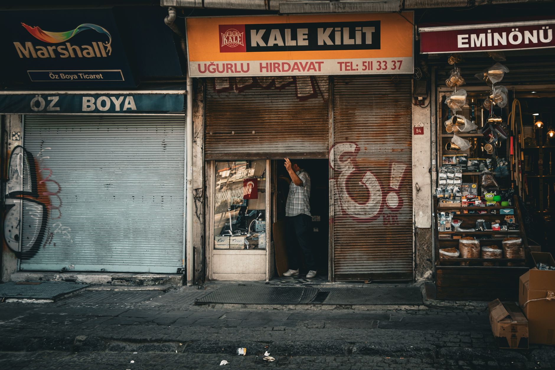 Empty storefront with a closed sign in a commercial neighborhood