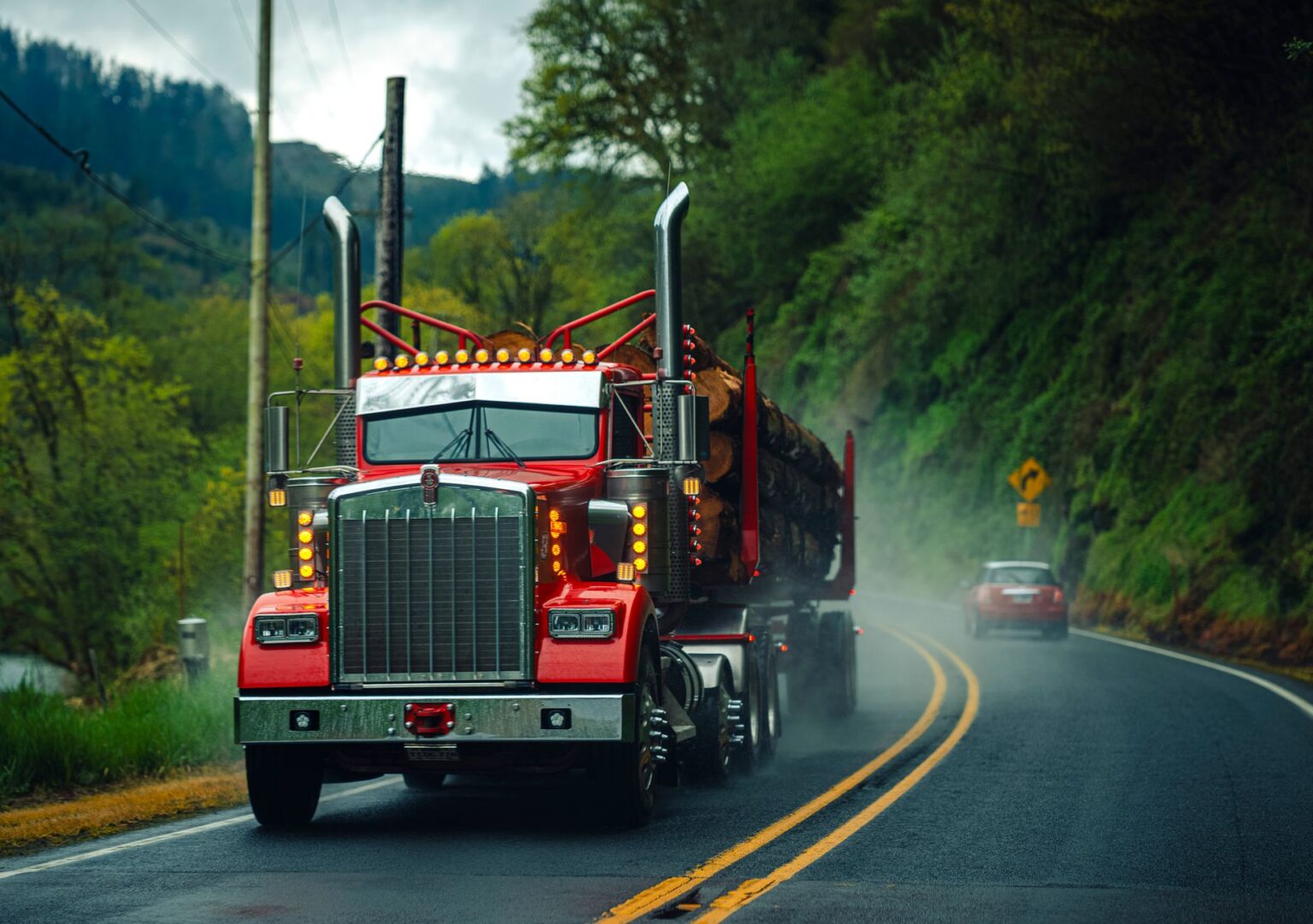 Semi truck driving on a highway representing the trucking freight industry