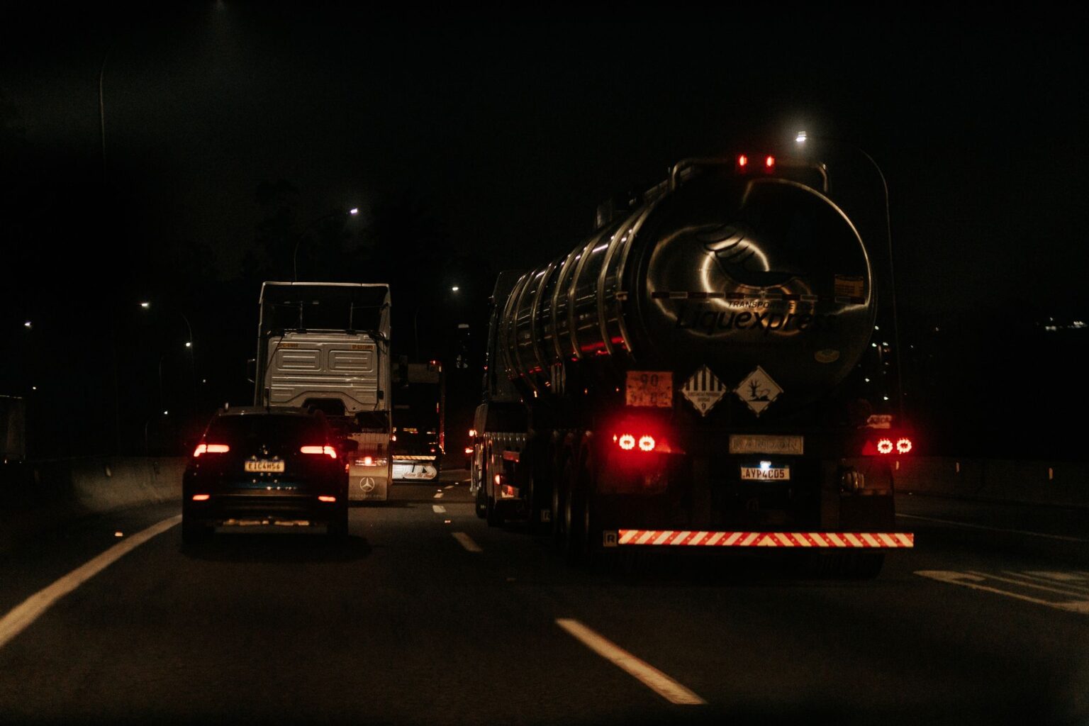 Commercial semi-truck driving on a highway representing the U.S. freight transportation industry