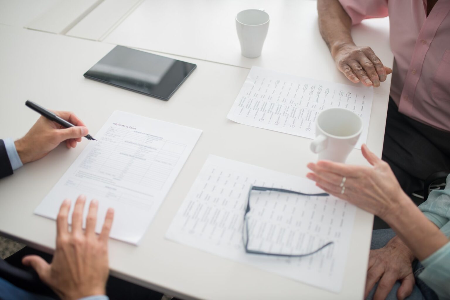 Medicare insurance documents and paperwork on a desk representing billing audits