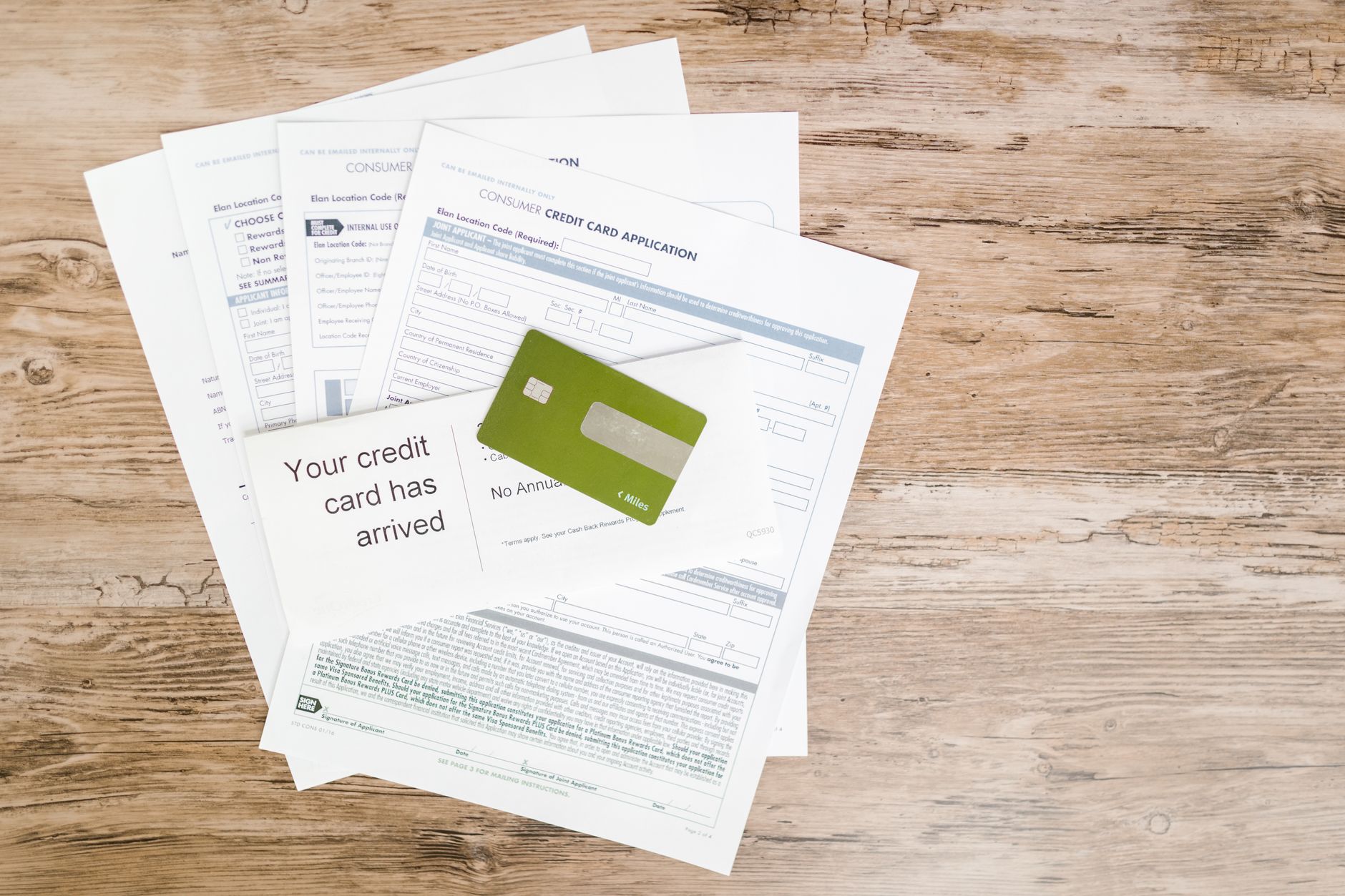 Business loan paperwork and financial forms on a desk