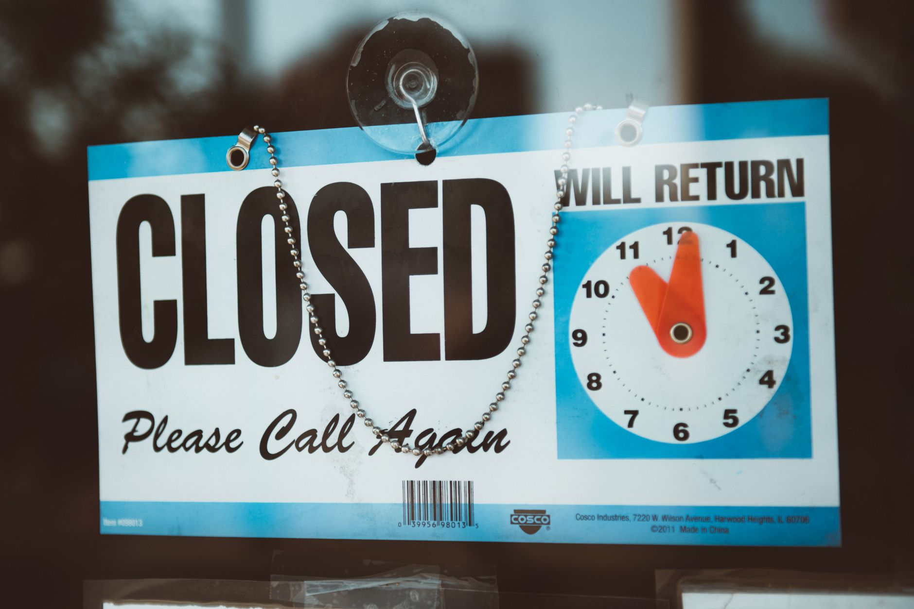 Closed sign on a business door, symbolizing childcare provider shutdowns