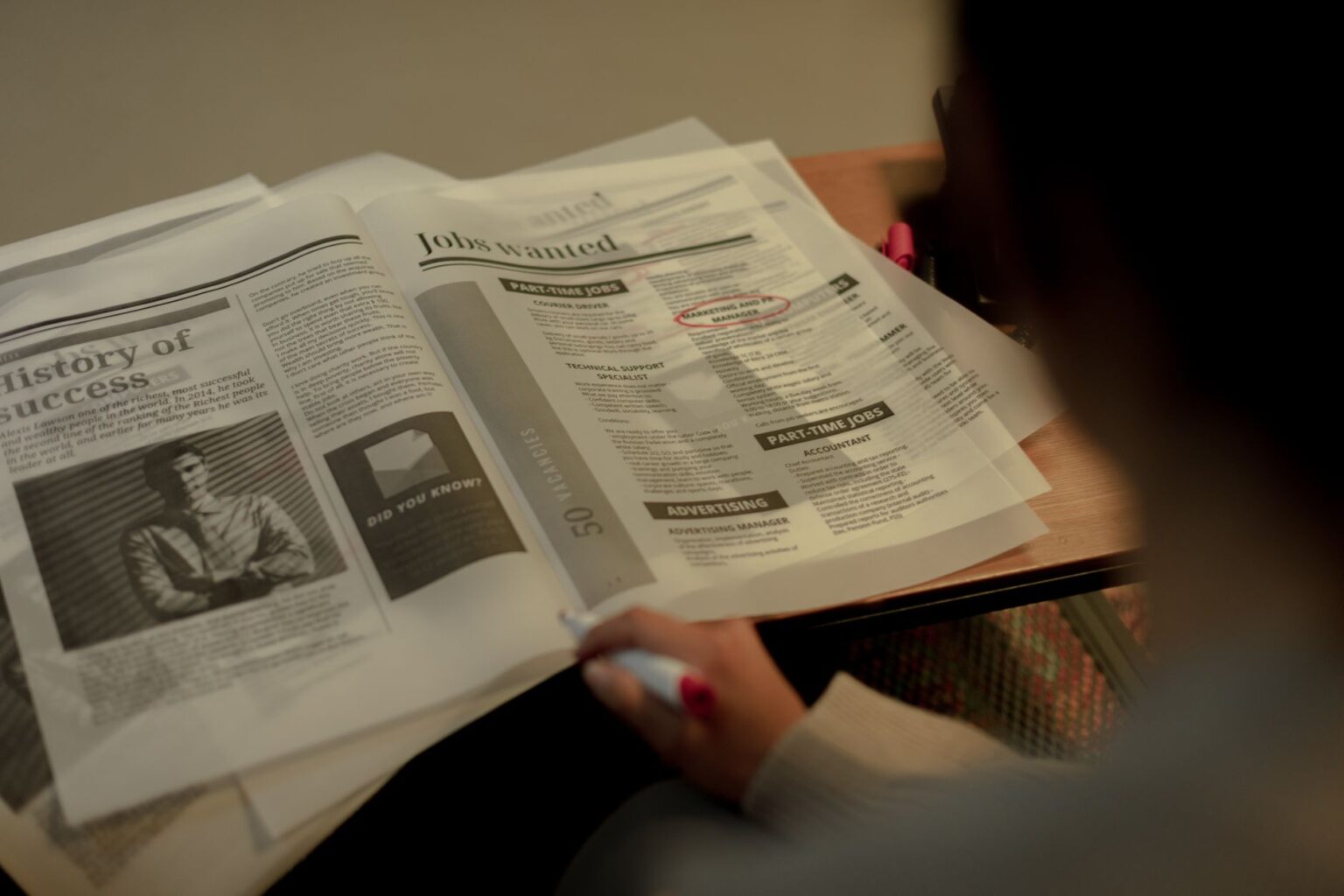 Long-Term Jobless Claims Quietly Climb as Reemployment Slows Person waiting in line at an unemployment benefits office
