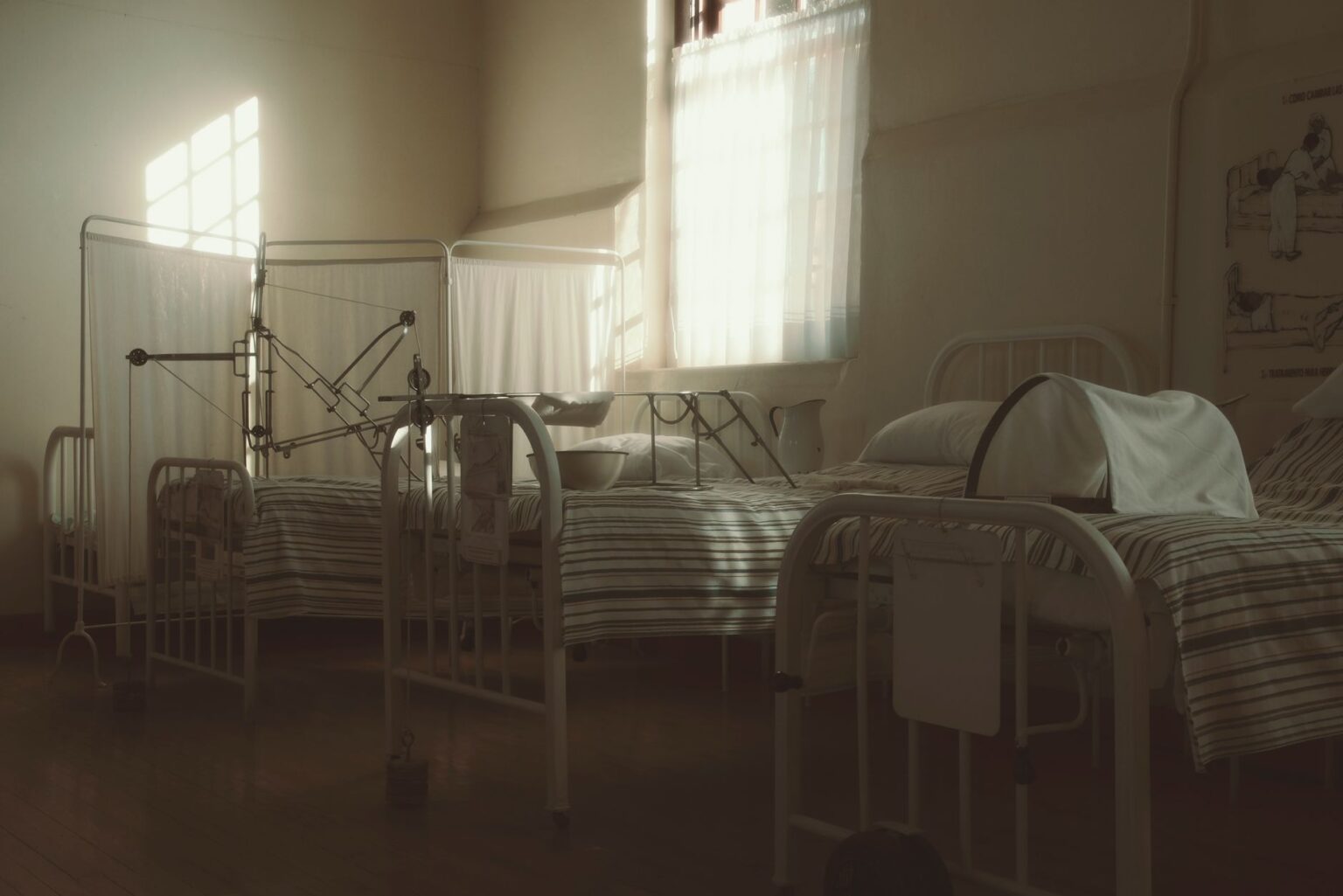 Rural Hospital Closures Accelerate as Medicaid Reimbursement Gaps Bite Small rural hospital building exterior in a remote community