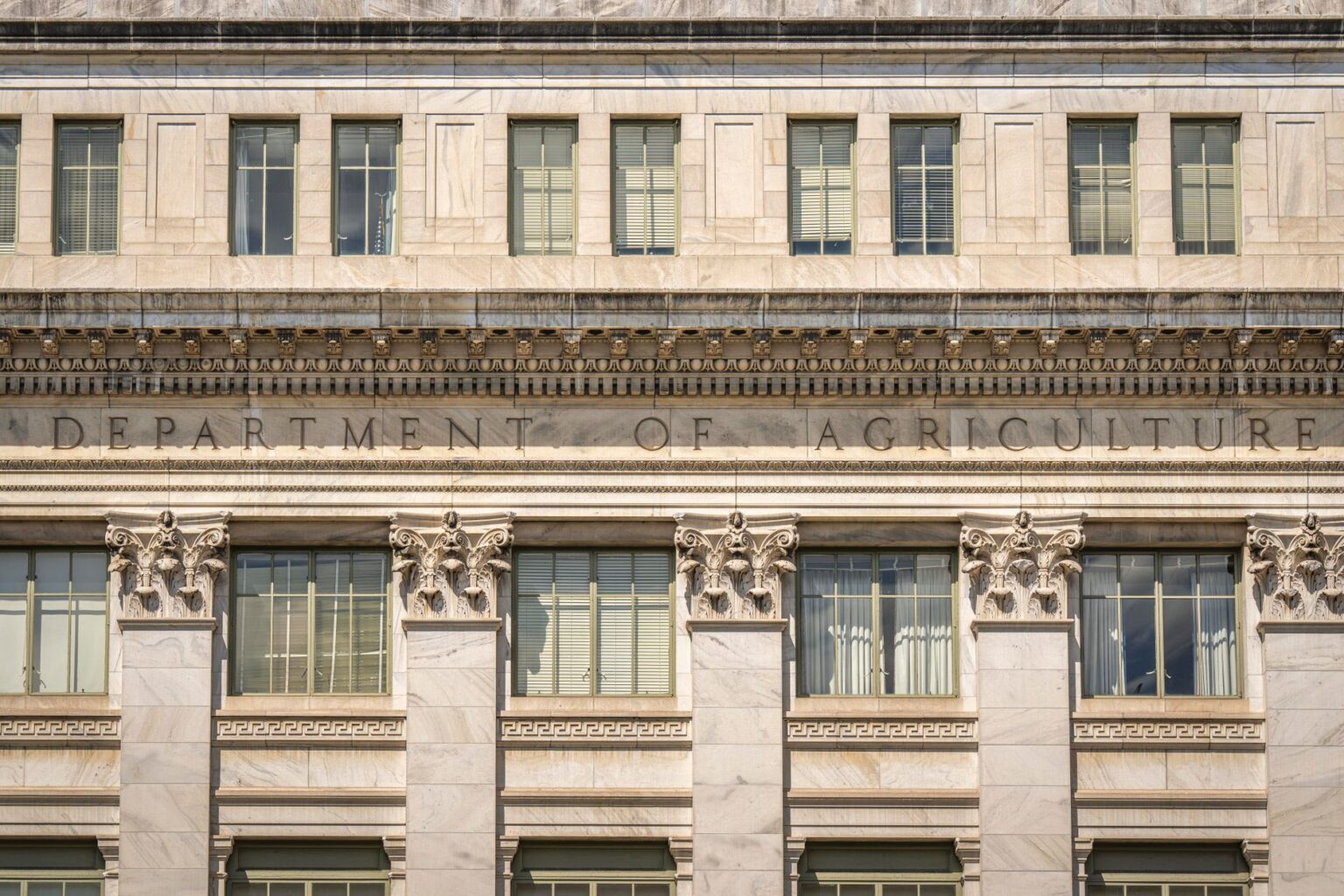 Federal government office building exterior representing defense contracting agencies