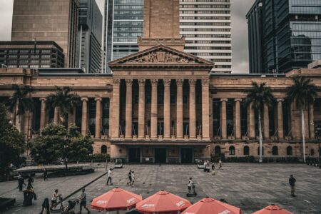Municipal Bond Ratings Slip as Property Tax Base Erodes Exterior of a municipal government building representing local public finance and bond issuance