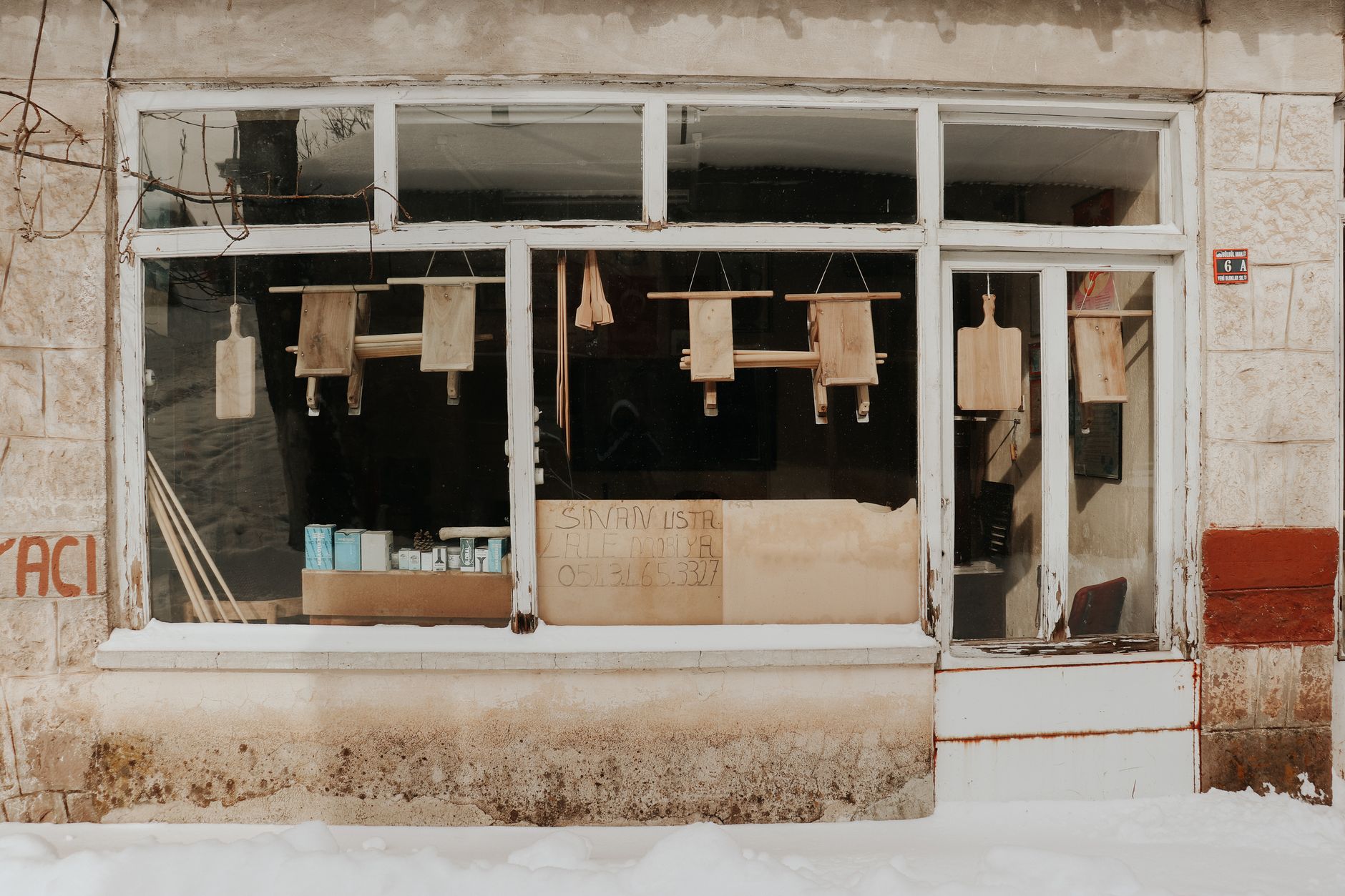 Empty retail storefront on a quiet street in a small college town