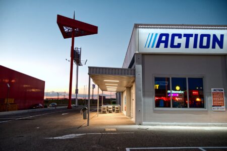 Retail Lease Defaults Pile Up as Strip Mall Vacancies Widen Empty strip mall storefronts with vacant retail spaces and a mostly empty parking lot