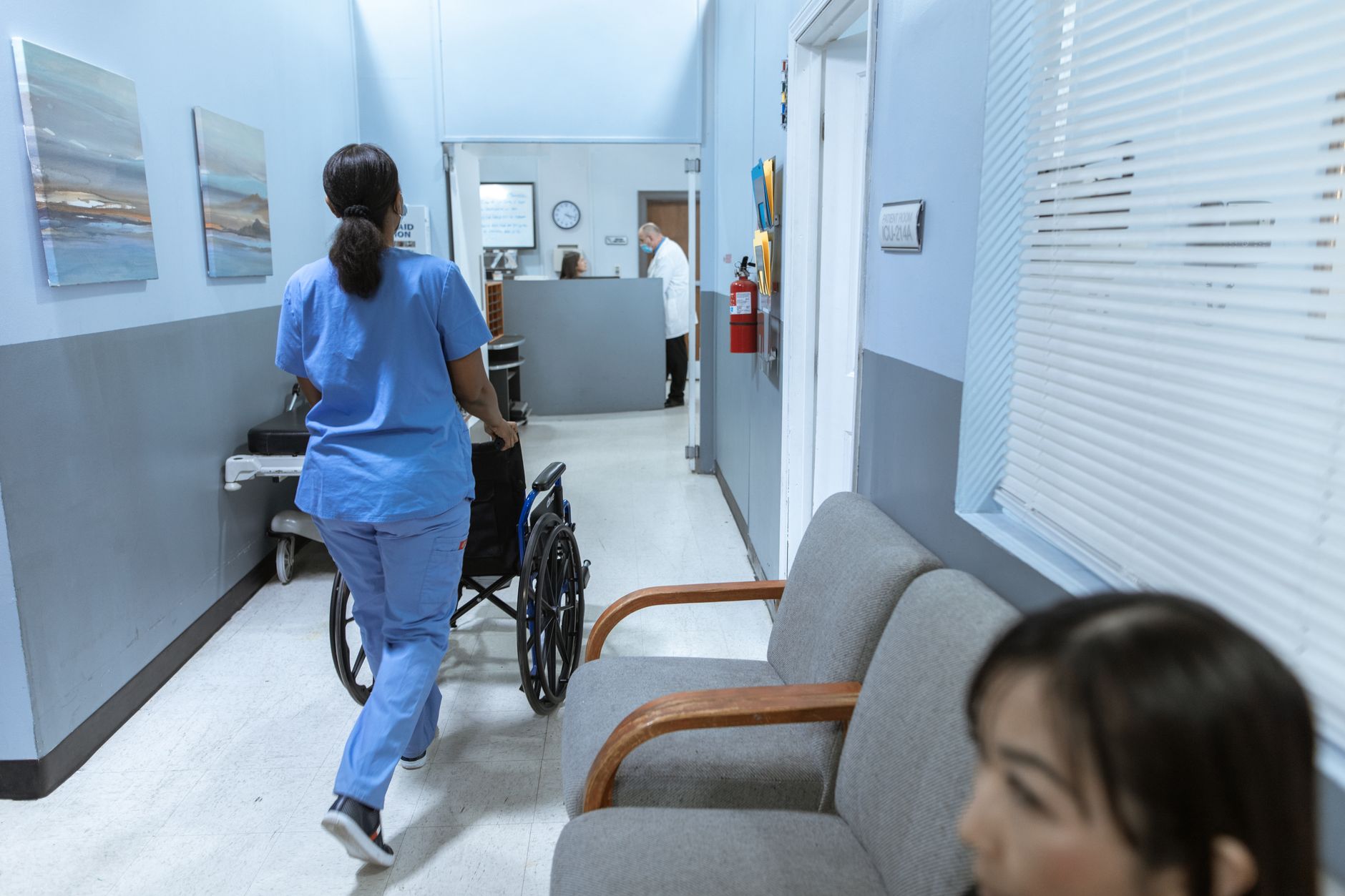 Empty hospital corridor illustrating healthcare cost pressures in Medicaid managed care