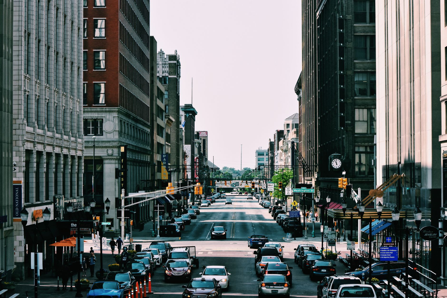 Street-level retail shops along an urban commercial corridor