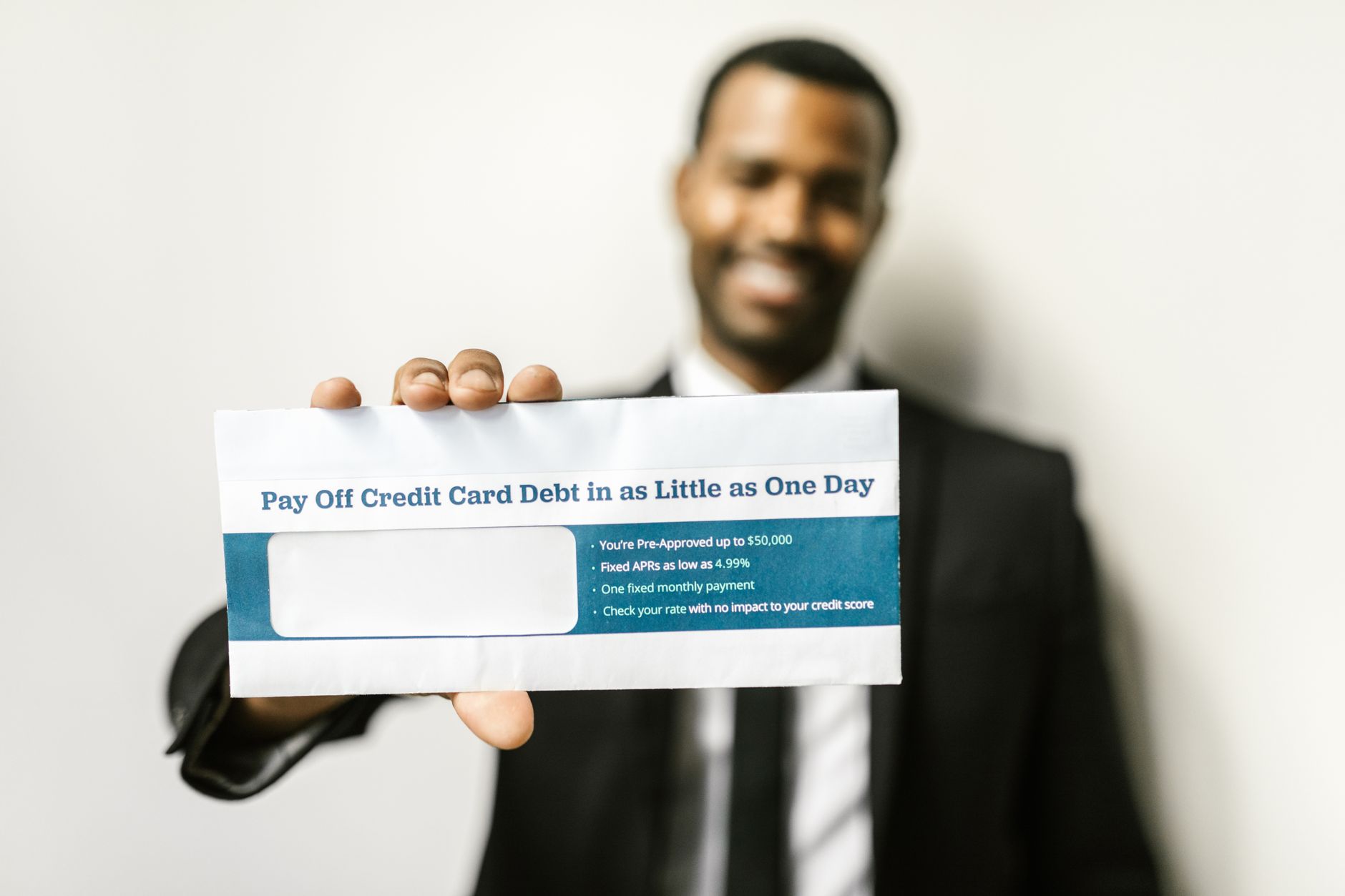 A person reviewing a credit score report on a laptop screen